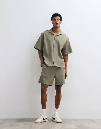 ASOS DESIGN co-ord plisse shorts in mid length in khaki
