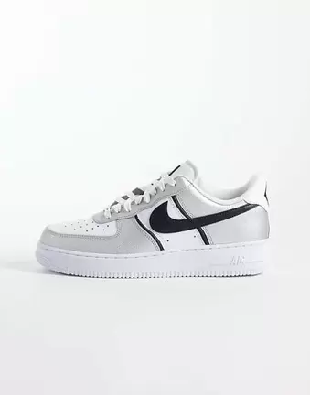 Nike Air Force 1 LV8 trainers in metallic and black