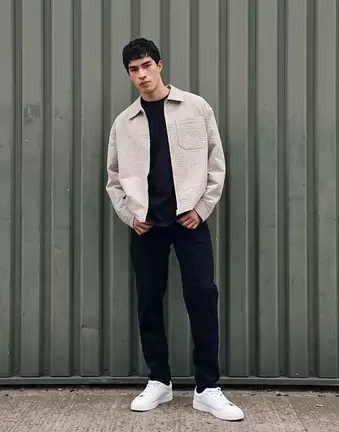 ASOS DESIGN tapered jeans in black