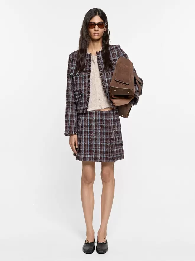 Blazer with squares and fringes