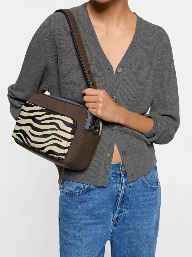 Animal-print crossbody bag with leather detail