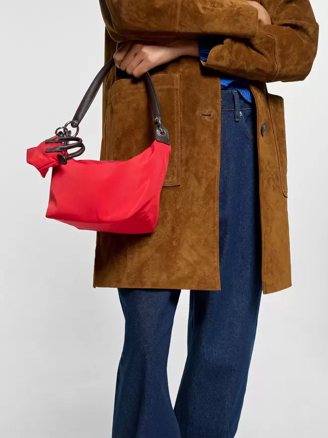 Nylon shoulder bag with charm
