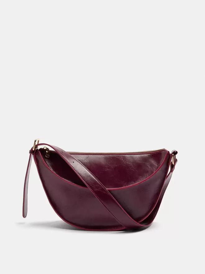 Crescent shoulder bag with cracked effect