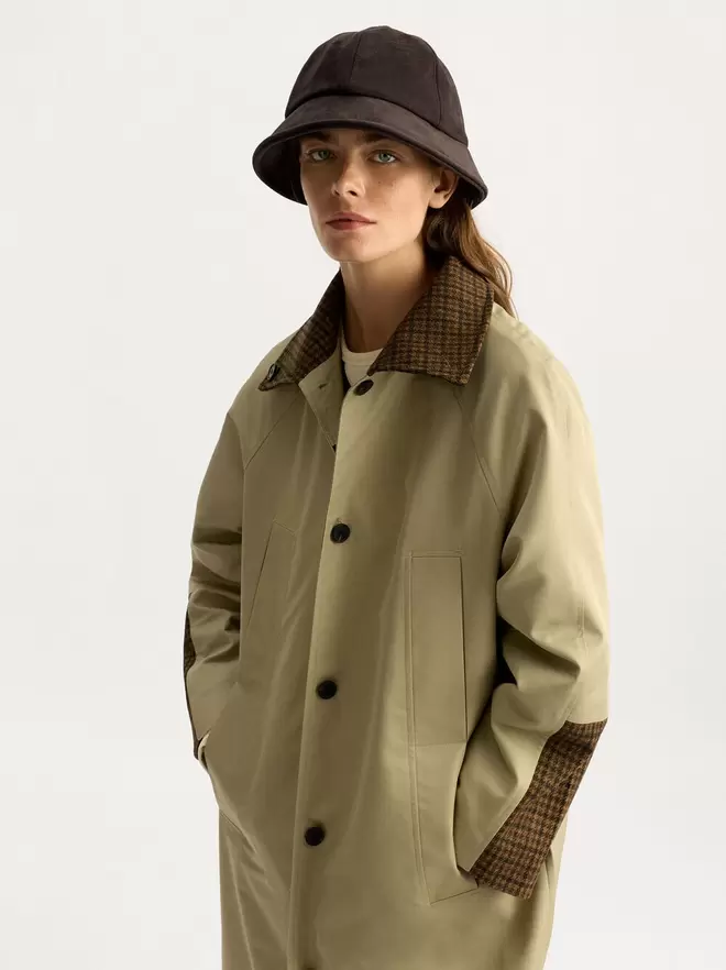 Bucket hat with cuff and cords