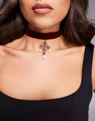 ASOS DESIGN velvet choker with cross and faux pearl details in burgundy