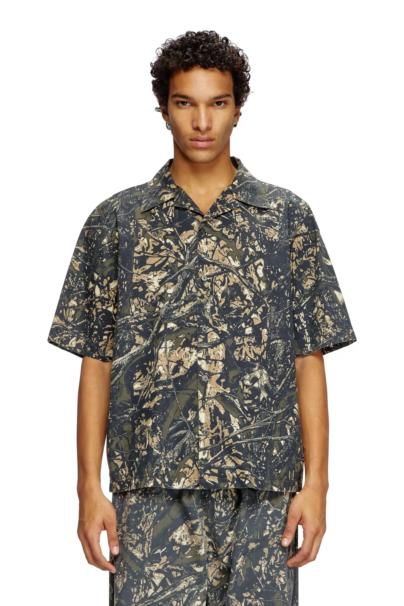 Short sleeved shirt with camo print