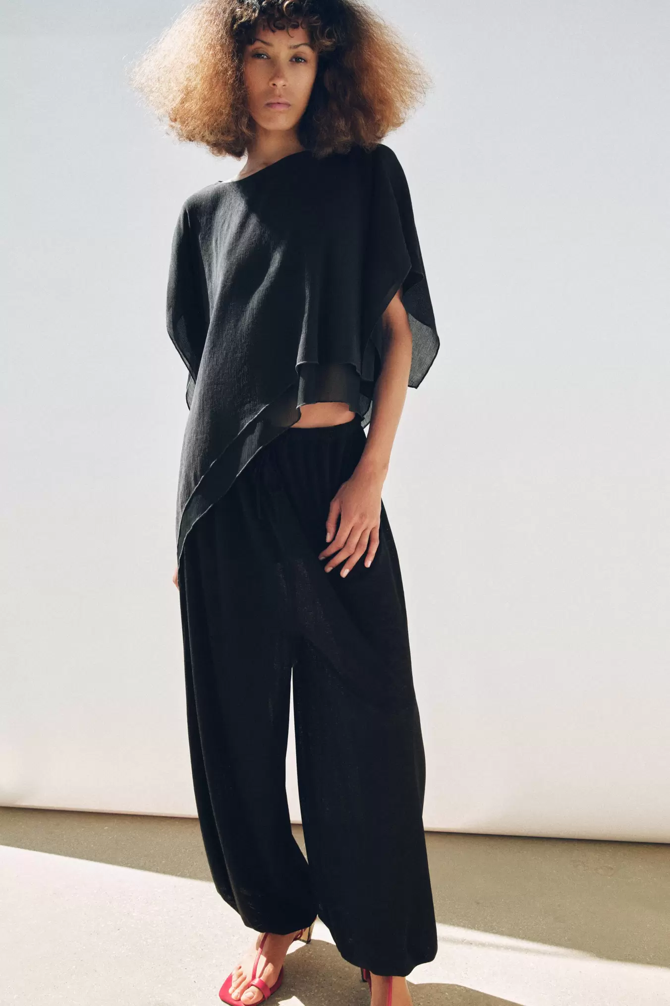 TEKSTURERT ASYMMETRISK KAPPE