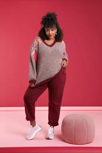 Gestreepte trui met borduursels €59,99