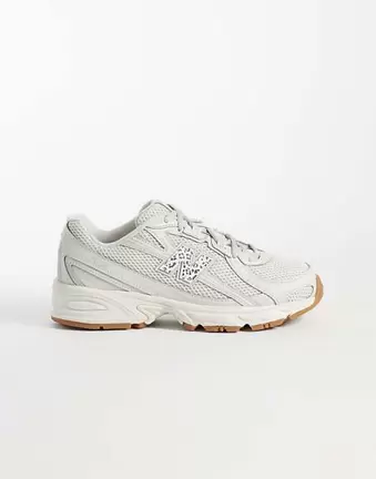 New Balance 740 trainers in off white and leopard print