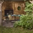 Atlas - Table de jardin en acier et plateau carrelé imitation zellige vert, 6 personnes, L185 cm