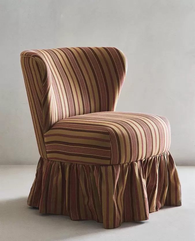 STRIPED ARMCHAIR WITH RUFFLE | KATHARINE POLE LACQUERED MANGO WOOD TABLE
