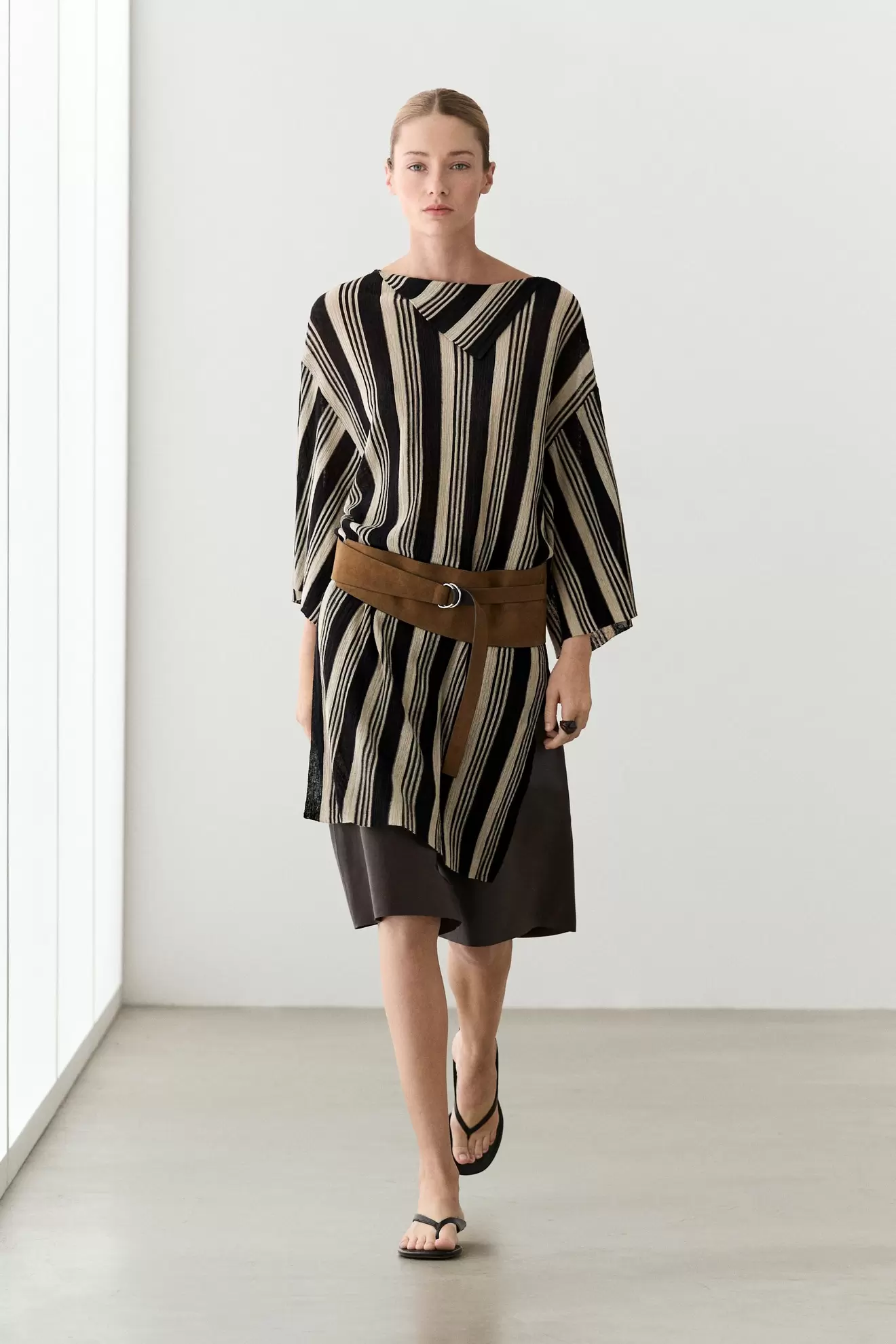 Pull en maille style tunique rayé