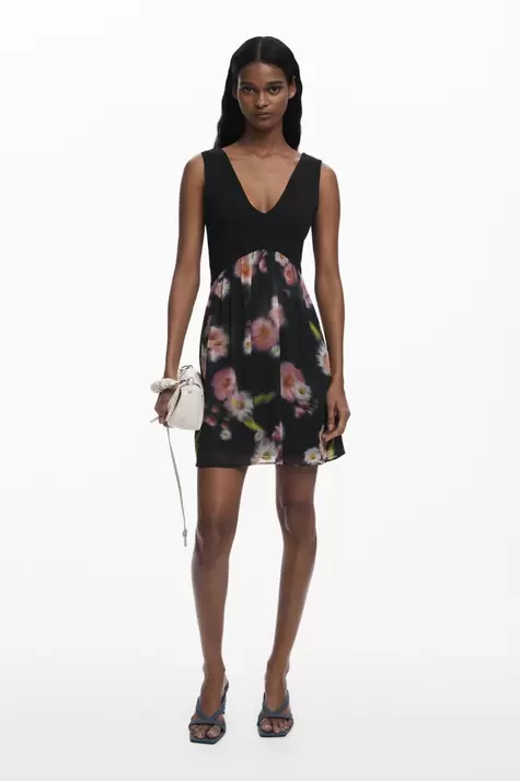 Korte jurk met bloemen in twee materialen
