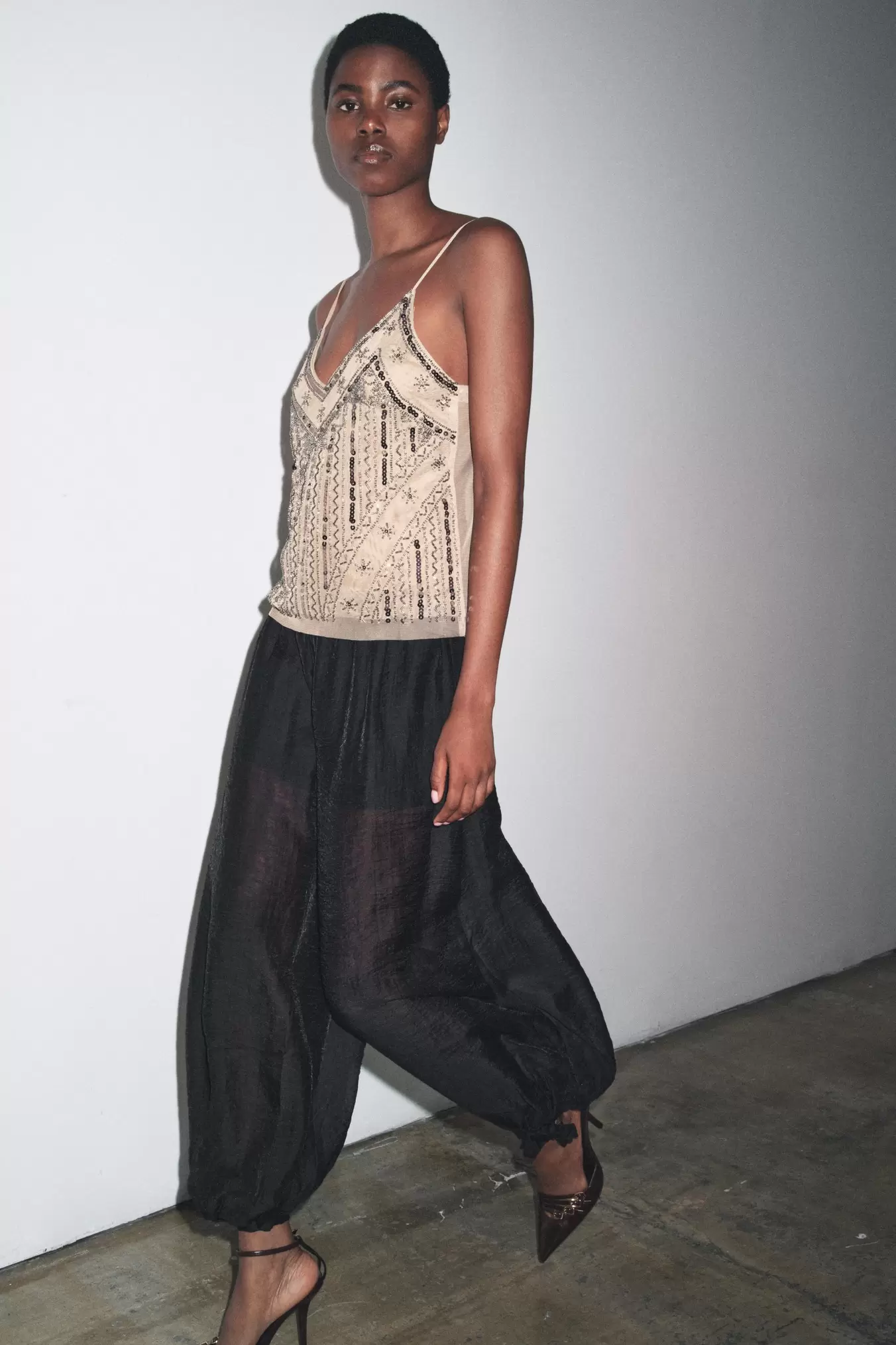 GEBORDUURDE TOP IN LINGERIESTIJL