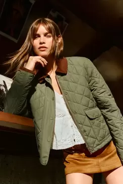 Short padded jacket with corduroy neck