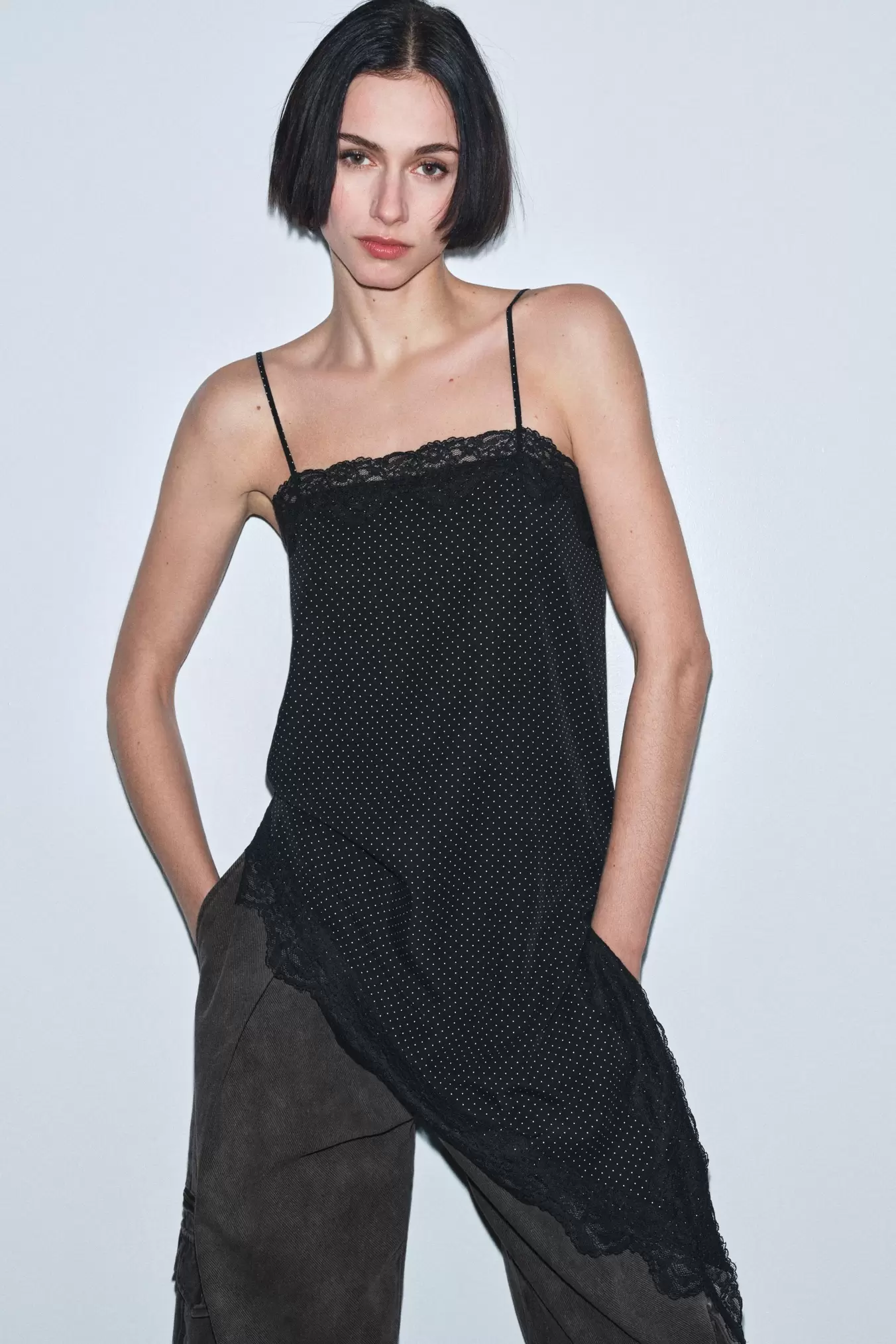 ASYMMETRISCHE TOP MET STIPPEN ZW COLLECTION