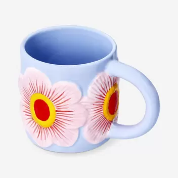 Blue mug with big embossed flower...