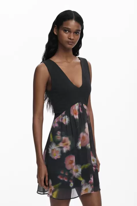 Korte jurk met bloemen in twee materialen