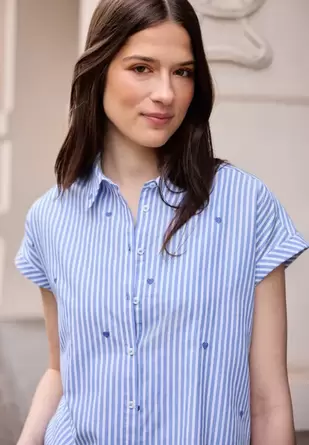 Blouse met hangende schouder en borduursel