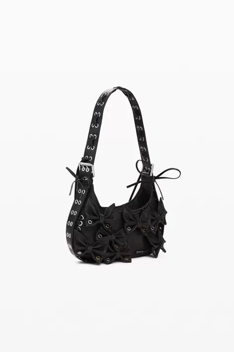 Kleine tas met vlinderapplicaties