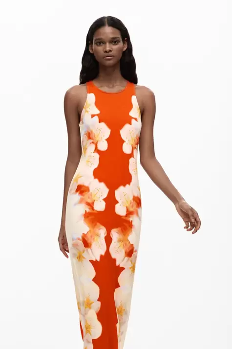 Jurk met bloemen aan de zijkant