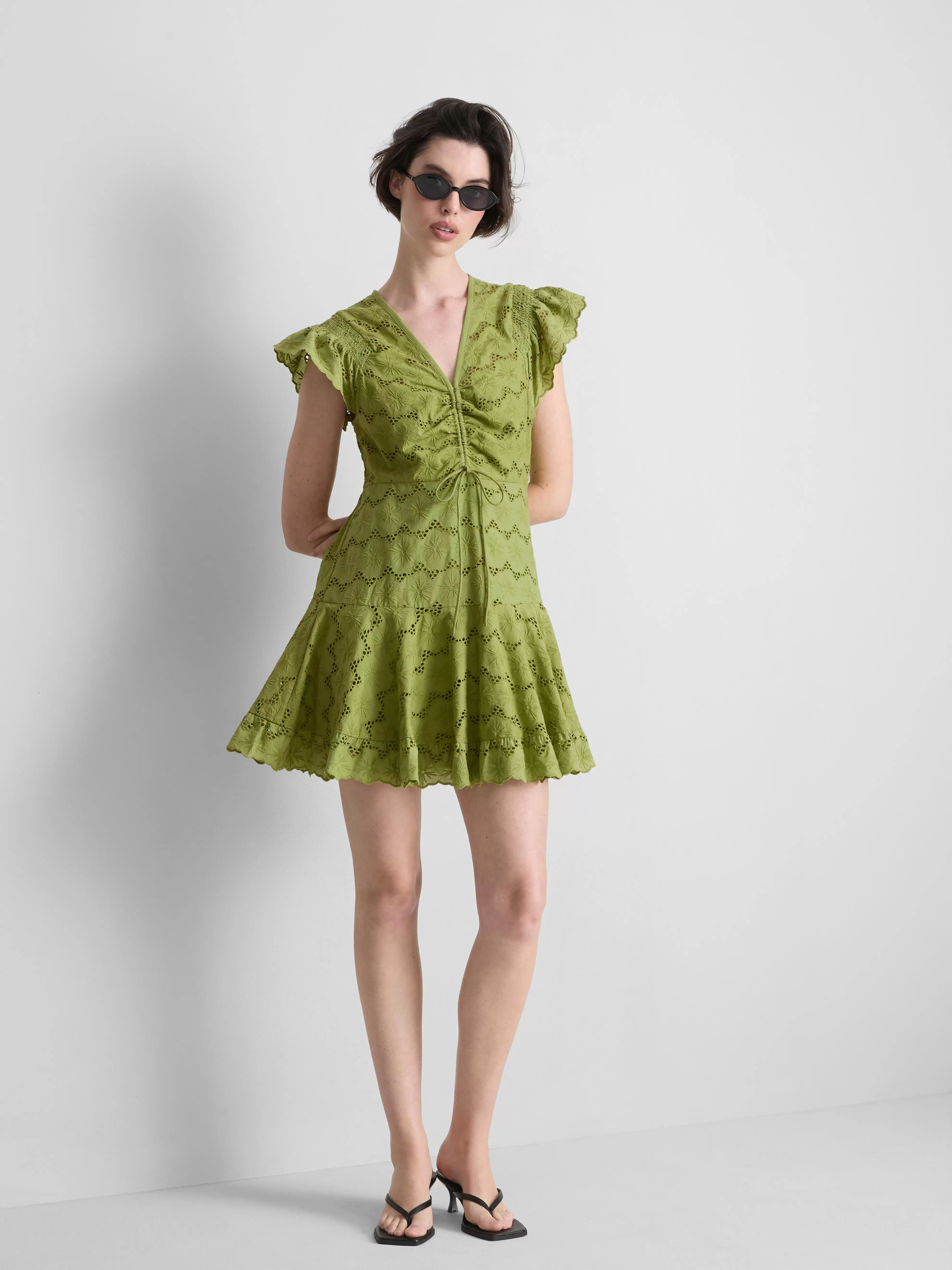 Katoenen mini-jurk met broderie en ruches
