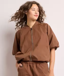 Vest met pofmouwen en tape