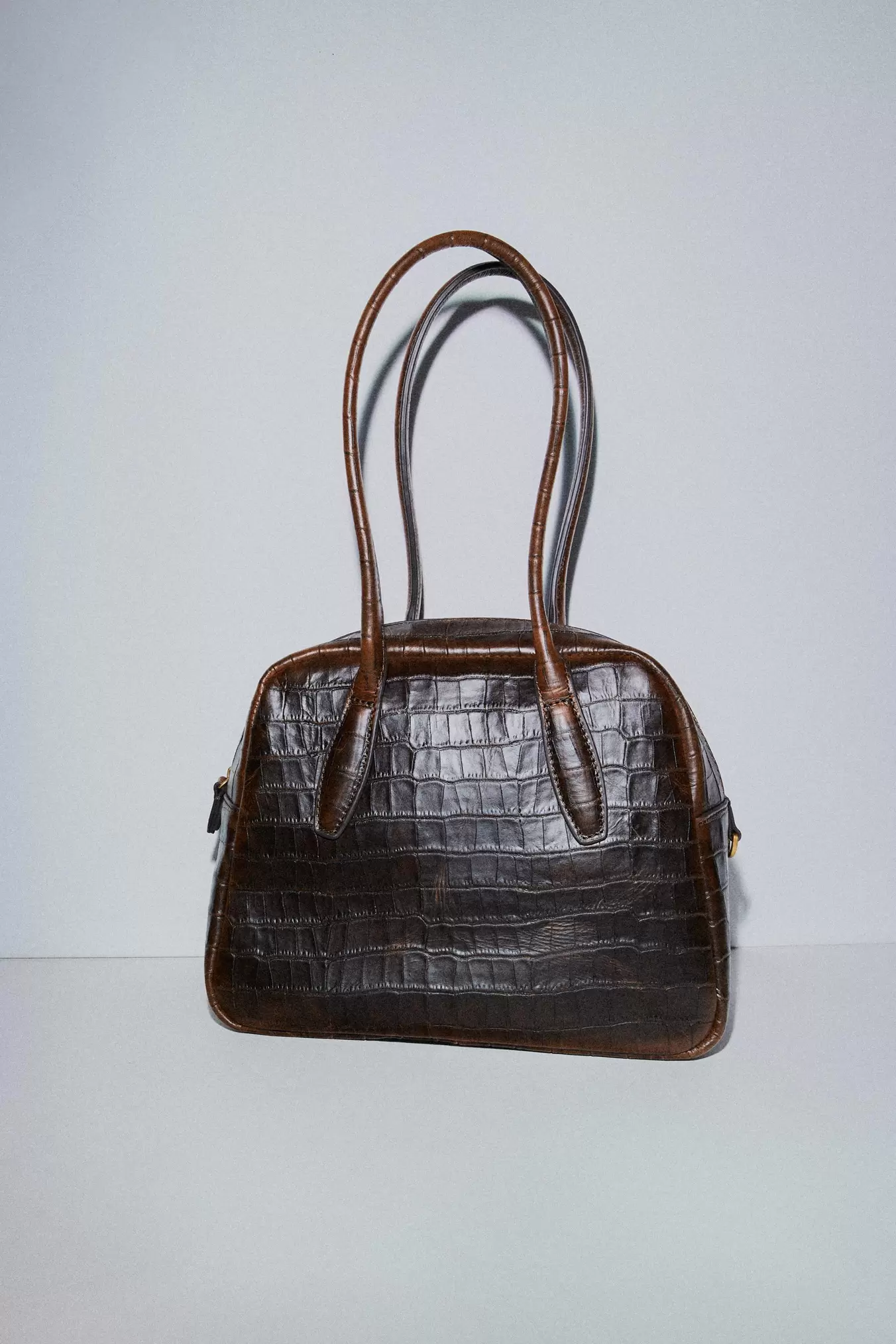 EMBOSSED LEATHER BOWLING BAG