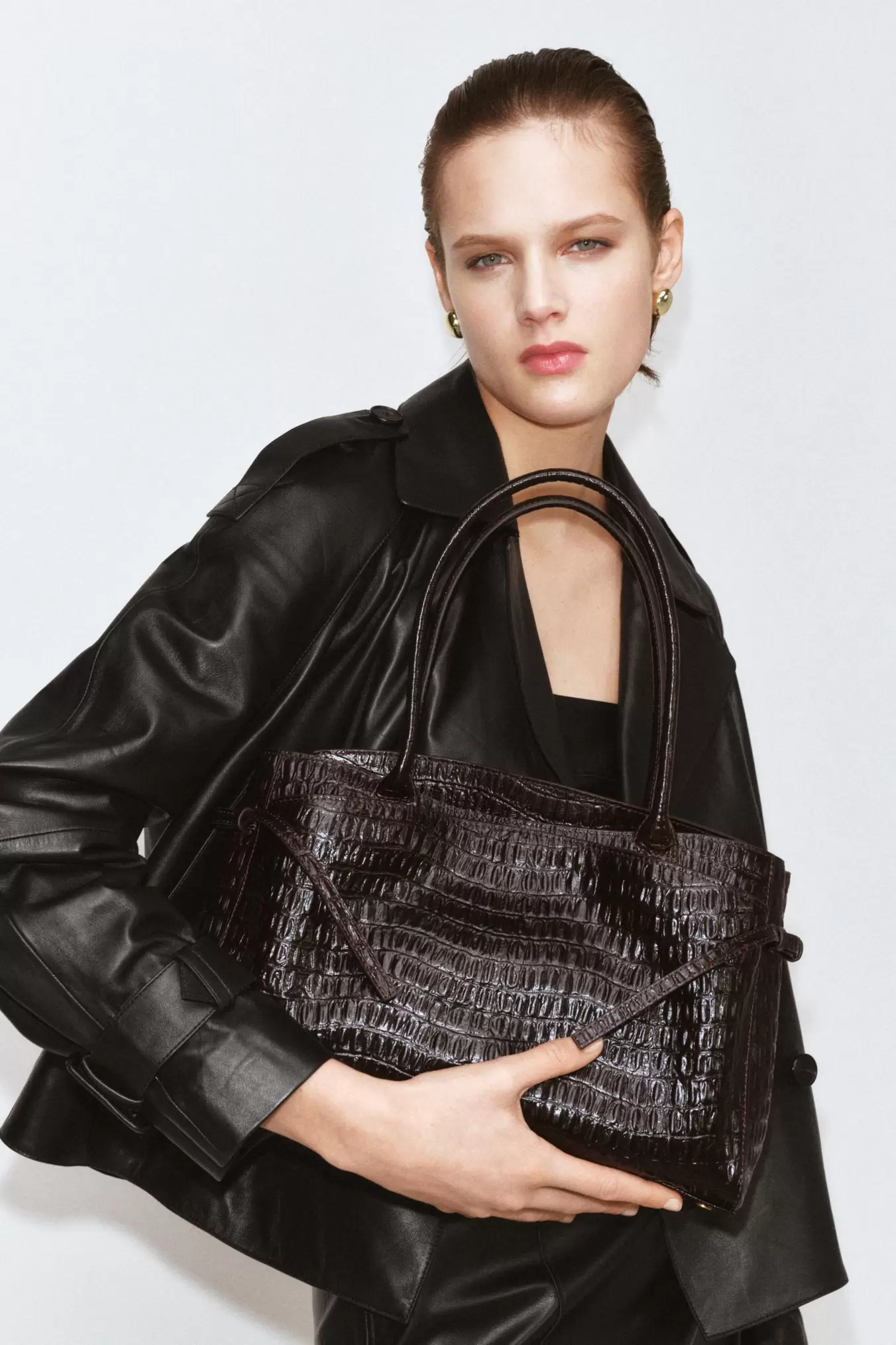 EMBOSSED LEATHER CITY BAG