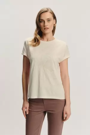 Kremowy top z subtelnym nadrukiem
