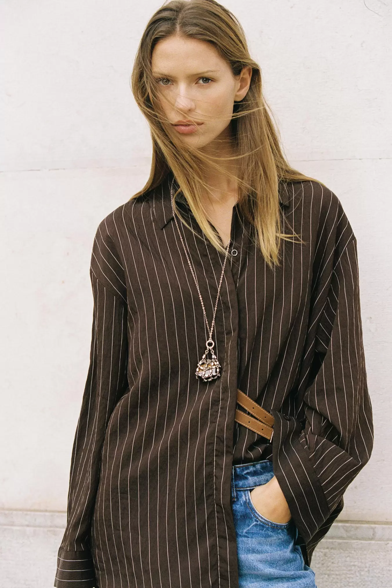 STRIPED SHIRT WITH BUCKLES