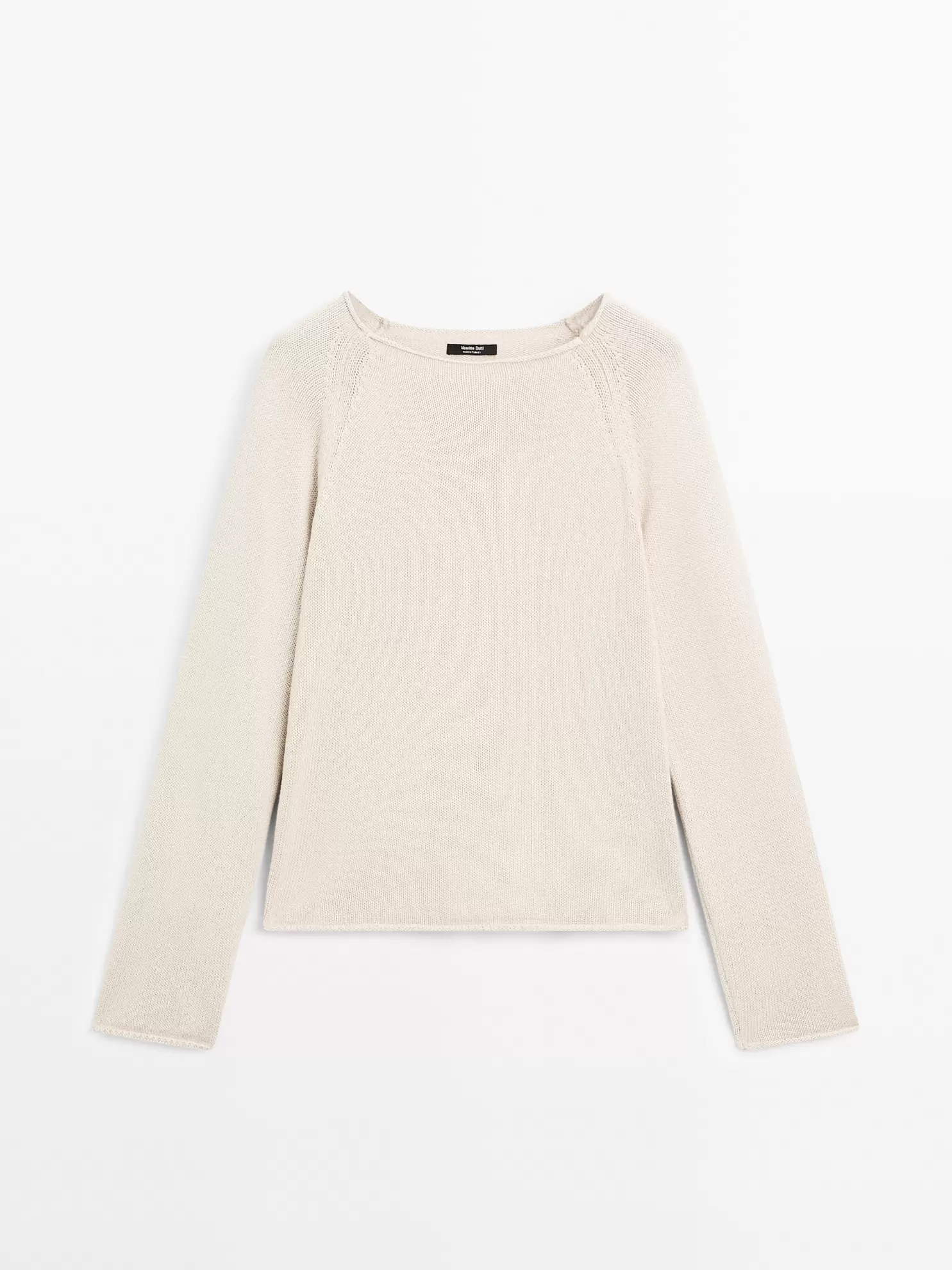 Ażurowy sweter wykonany ściegiem perełkowym