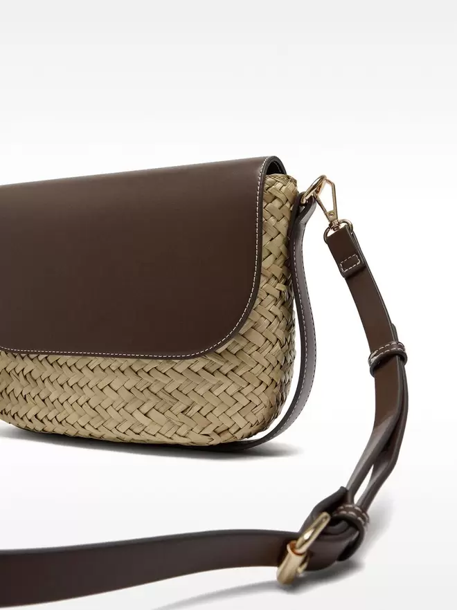 Crossbody bag made of straw with flap