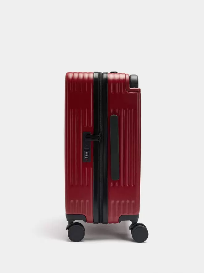 Striped travel suitcase