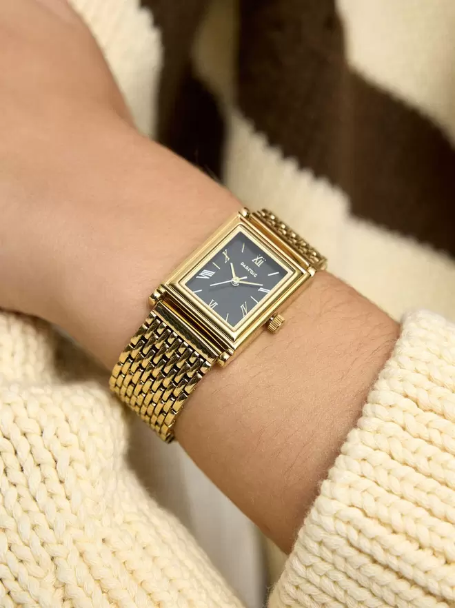 Square watch with a stainless steel bracelet