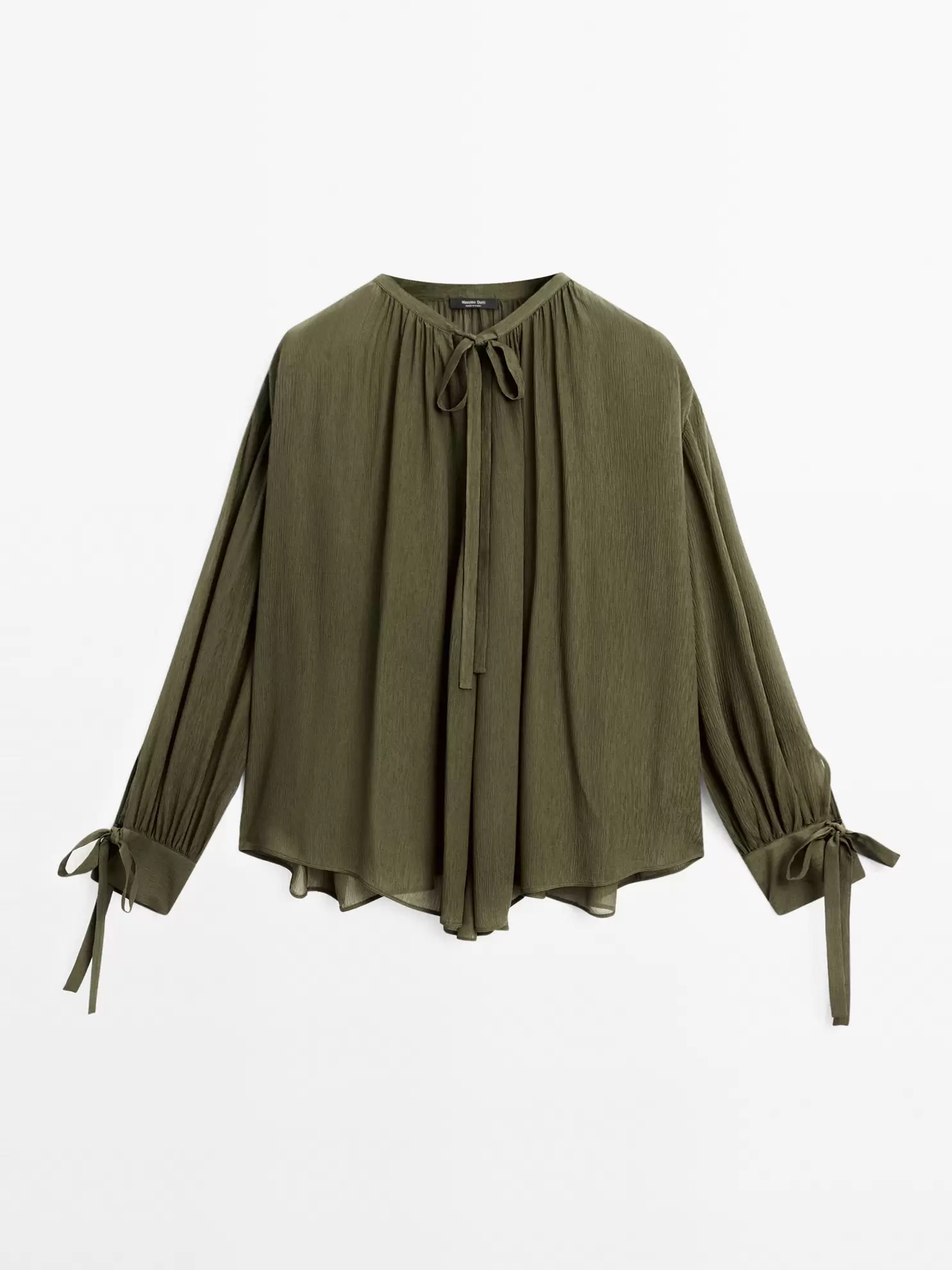 Bluzka o kroju peleryny z wiązaniami