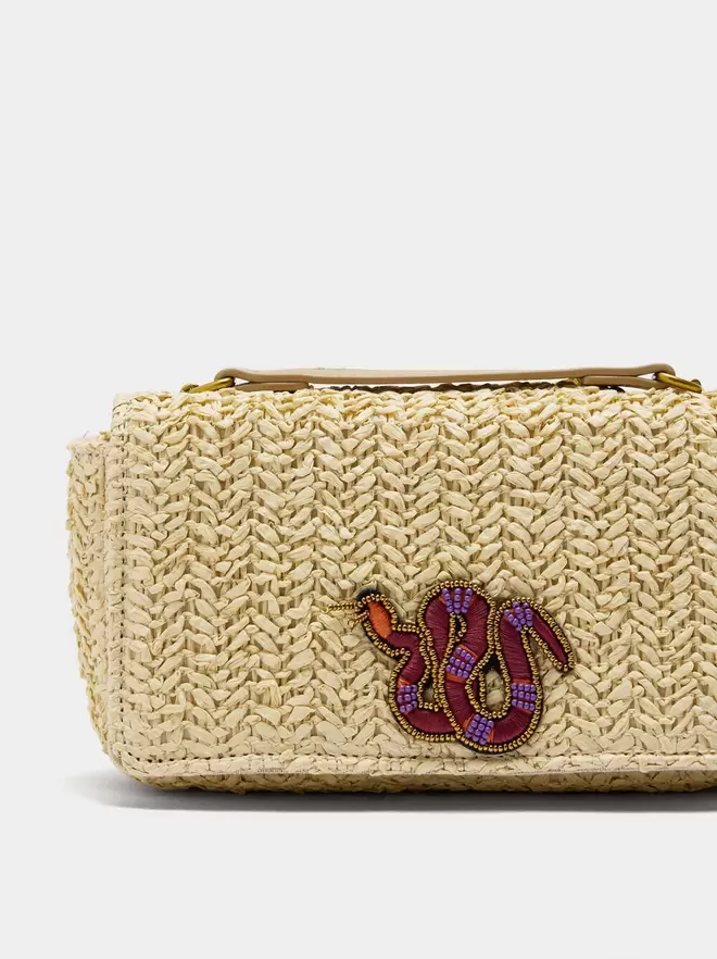 Shoulder bag with straw effect