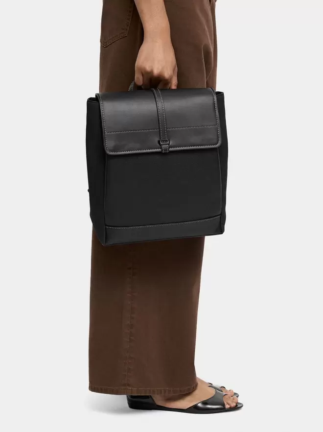 Leather-effect backpack with flap