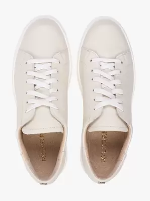 Kremowe sneakersy na platformie