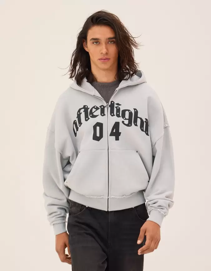 Bluza boxy z suwakiem i nadrukiem