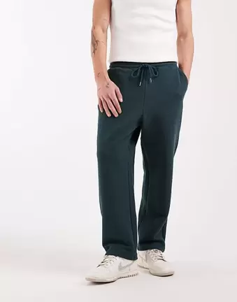 ASOS DESIGN – Ciemnozielone zwężane joggersy o luźnym kroju