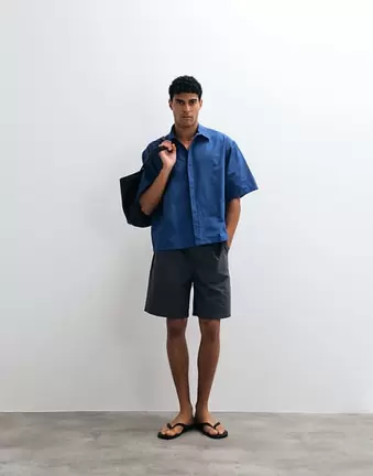 ASOS DESIGN – Niebieska koszula oversize z krytą plisą guzikową