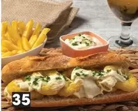 Sandwich with fries and sauce