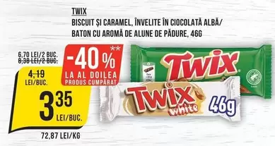 BISCUIT ȘI CARAMEL, INVELITE ÎN CIOCOLATĂ ALBĂ/ Bவதாக CU AROMĂ DE ALUNE DE PĂDURE