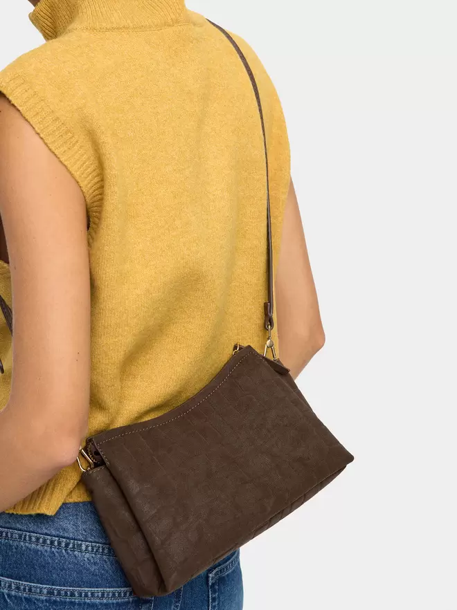 Crossbody bag with animal engraving