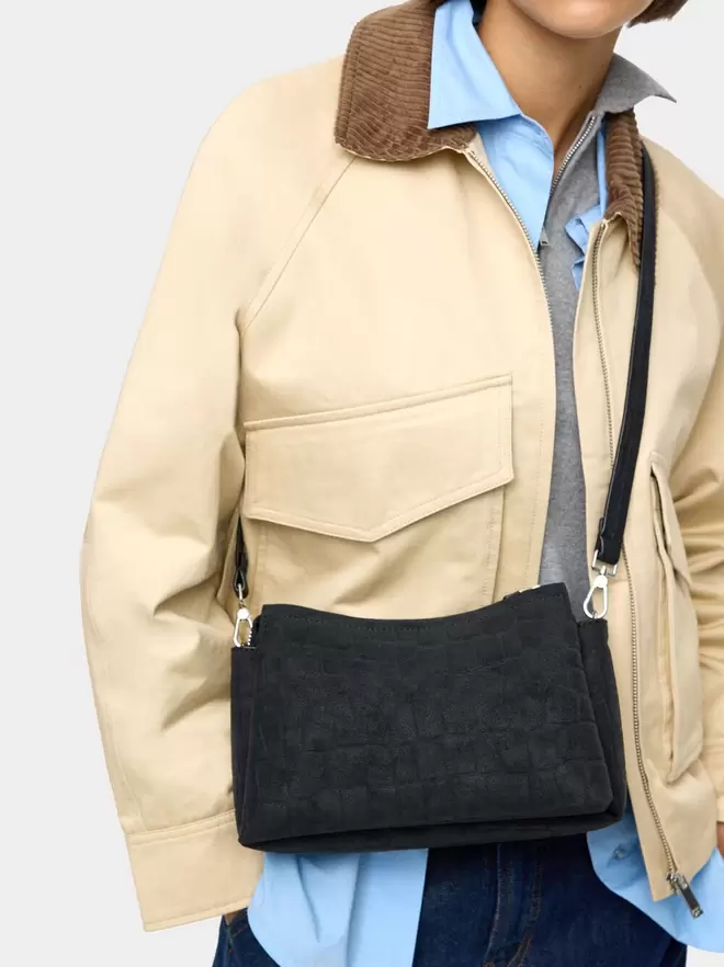 Crossbody bag with animal engraving