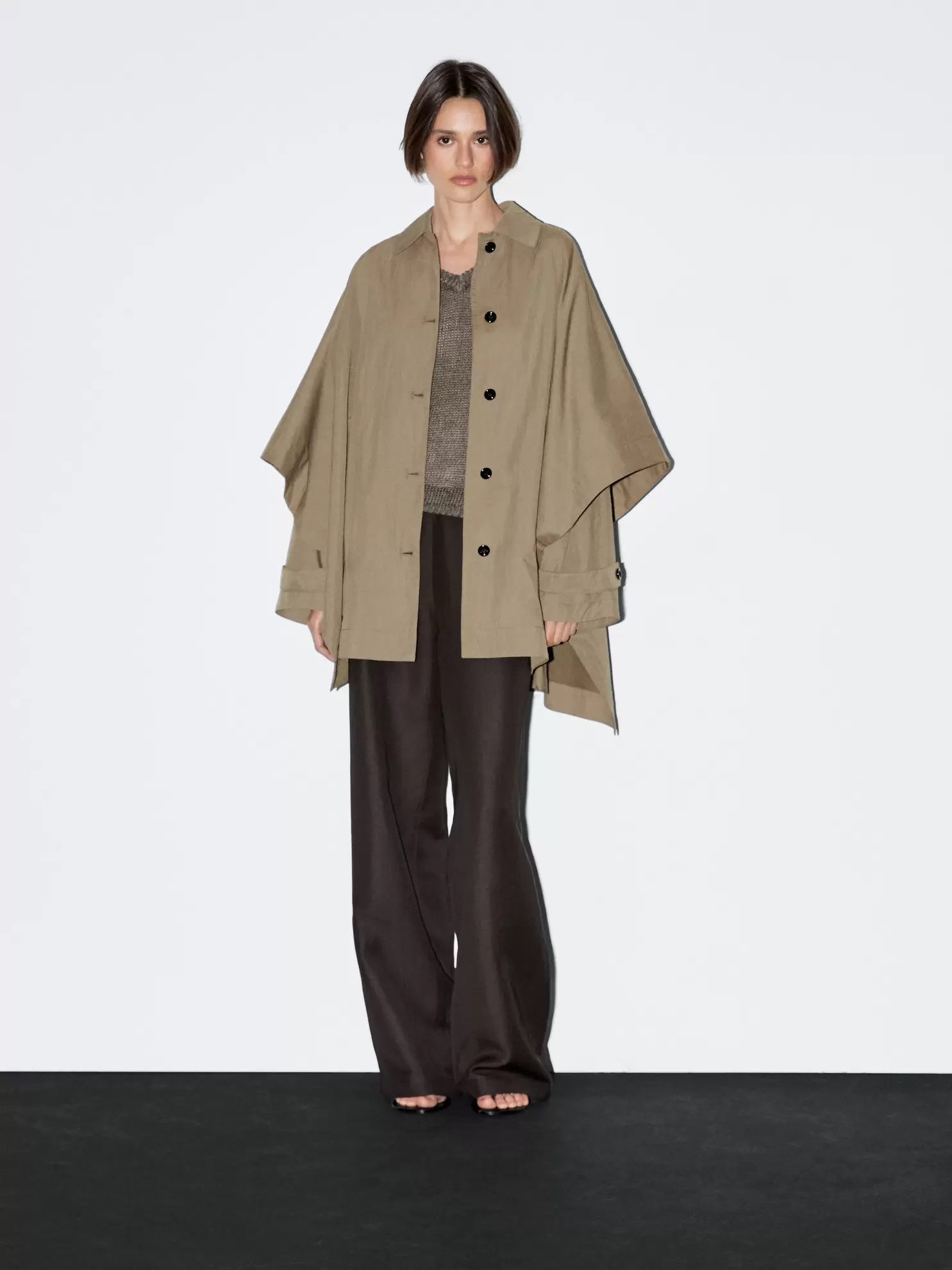 Cape trench coat with long sleeves