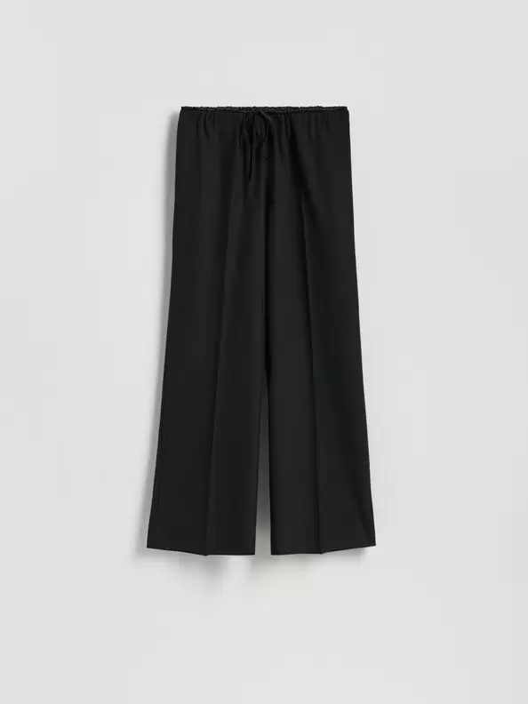 Pantaloni largi din tricot striat
