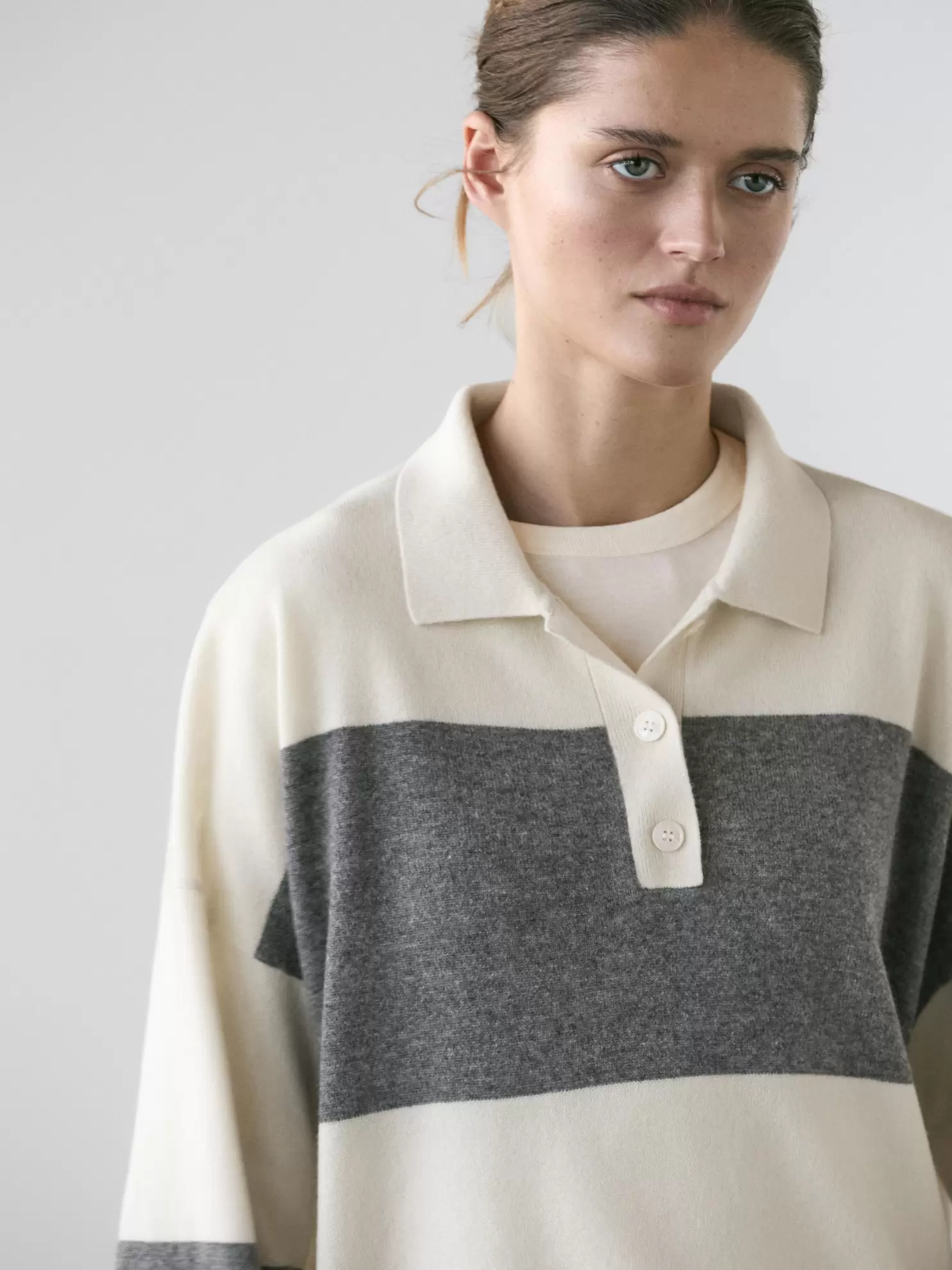 Striped knit sweater with polo collar