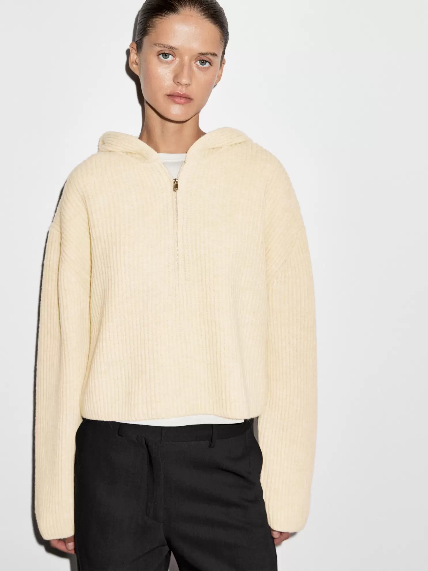 Knit wool blend sweater with hood detail